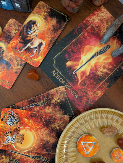 Written in the Stars Tarot cards by Emporos — Ace, King and Queen of Wands Fire element spread on a wooden altar with crystals, used for Sekhem healing and spiritual practice